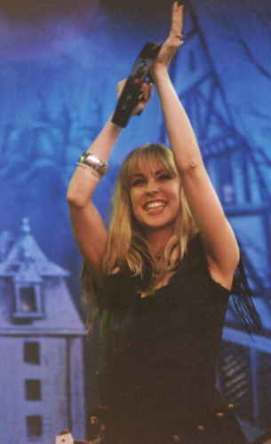 Candice Night playing tambourine Candice Night playing tambourine